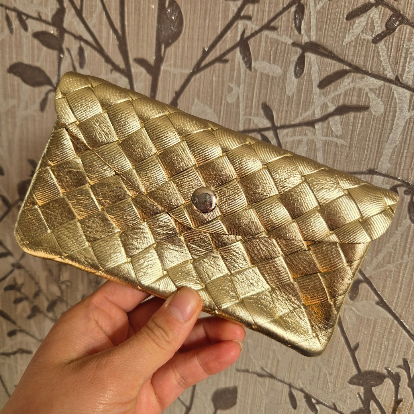 Woven leather coin purse