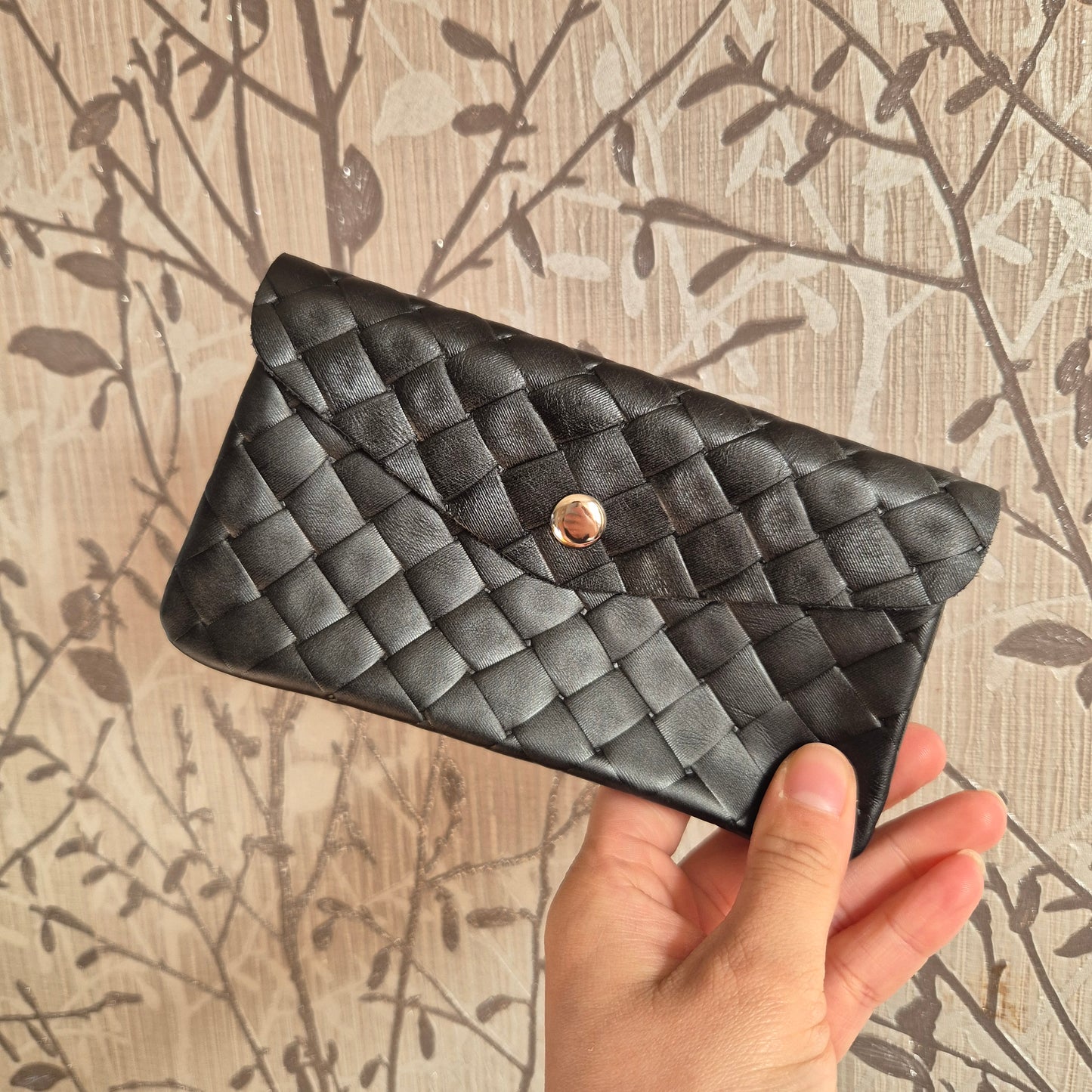 Woven leather coin purse